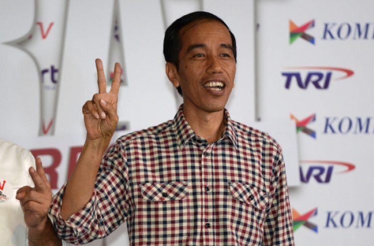 Indonesia’s Widodo rallies supporters ahead of election