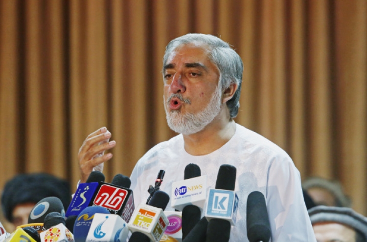 Afghan candidate set to reject result