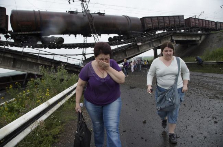 Ukraine bridges hit near rebel-held city