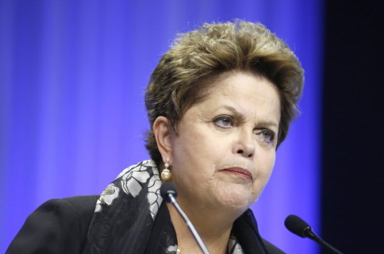For Rousseff, economy bigger issue than World Cup shame