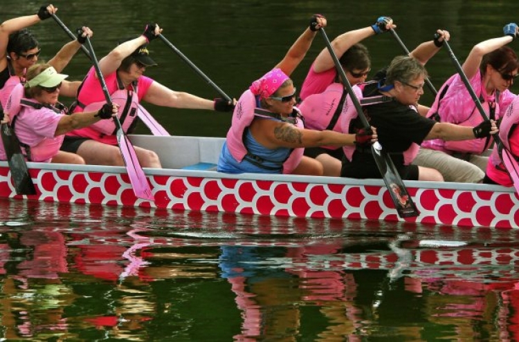 Ancient dragon boating gives cancer survivors a workout