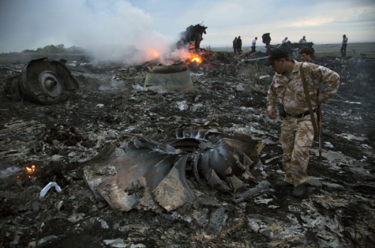 Malaysian plane shot down over Ukraine