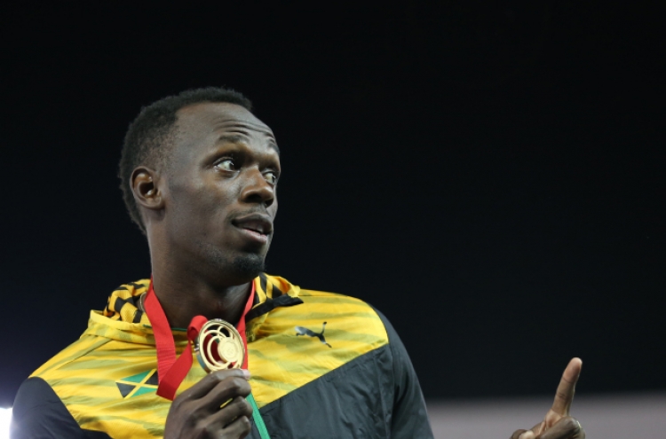 Usain Bolt strikes gold in Glasgow