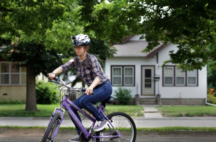 Look, man, no hands! Learning to ride a bicycle as an adult