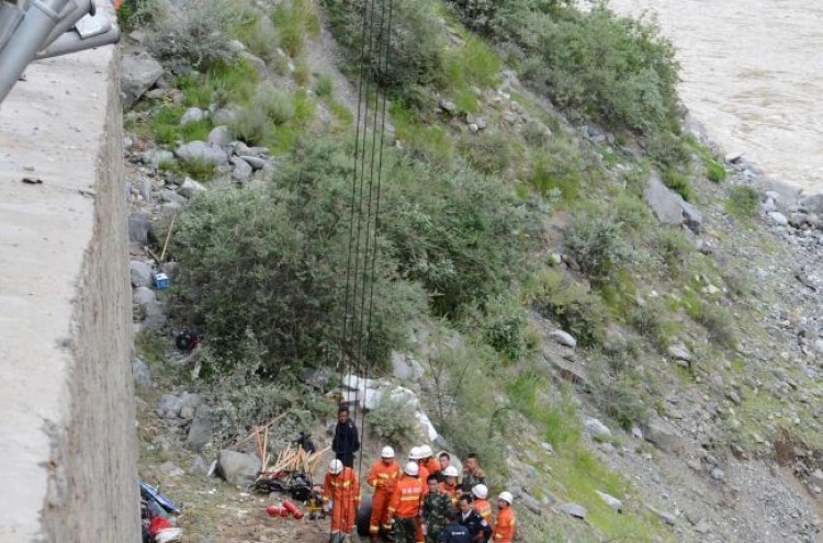 Tibet tour bus plummets into valley, killing 44