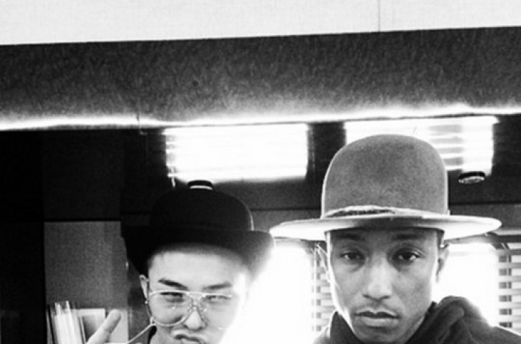 G-Dragon pictured with Pharrell Williams