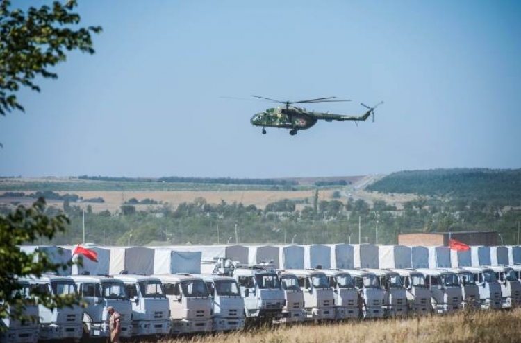Scramble to defuse Ukraine tensions as deal nears on aid convoy