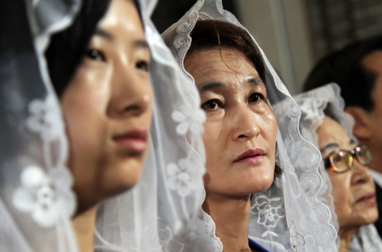 Pontiff’s visit draws increasing attention to Catholicism in Korea