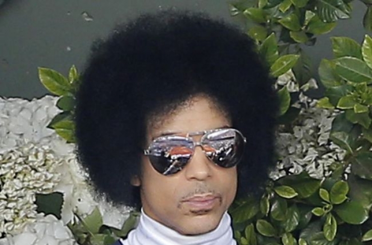 Prince to release new albums after record label bust-up
