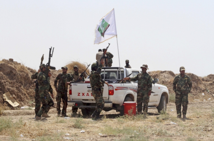 Iraq breaks militant siege of Shiite town