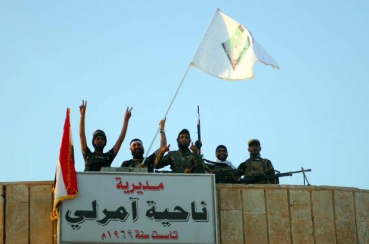 Iraq presses advance against jihadists stormed