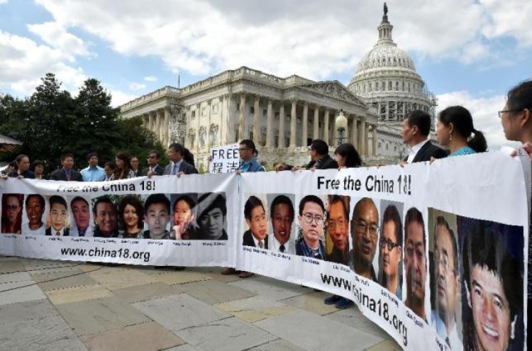 Daughters of Chinese activists demand meeting with Obama