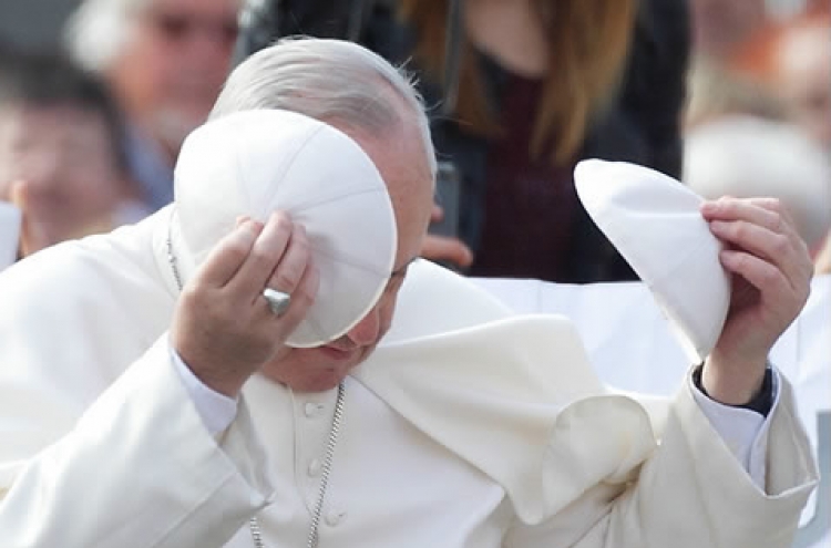 Pope’s skull cap raises over 100,000 euros on eBay