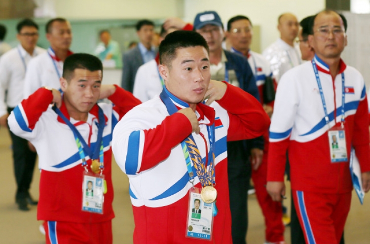 [Asian Games] N. Korean lifters dedicate victories to young leader