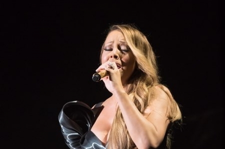 [Herald Review] Mariah Carey fails to prove 'elusive chanteuse' title