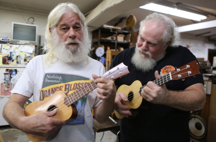 From Jimmy Buffet to Genesis ace, guitarists flock to fix-it factory