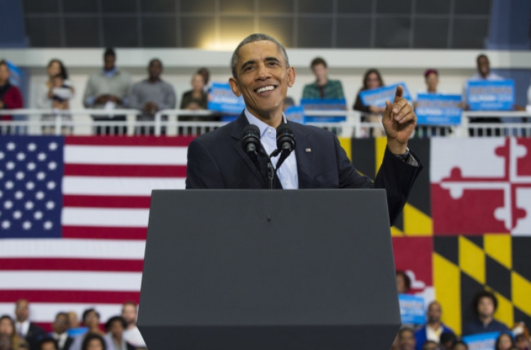 Obama marches on campaign trail, attacking Republicans