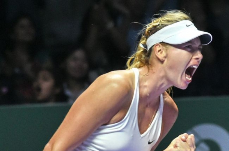Wozniacki beats Sharapova at WTA Finals