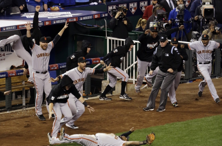 Giants hold off Royals to win World Series