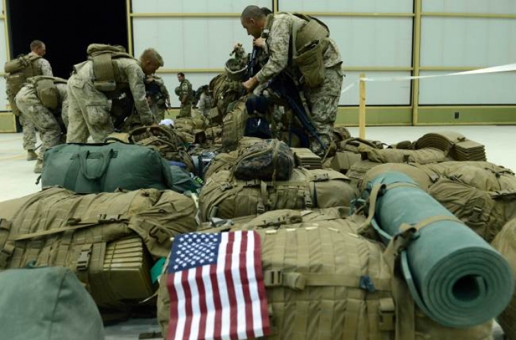 Demolition derby at huge U.S. base as Afghan exit quickens