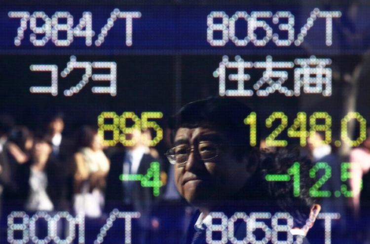 Tokyo investors cautious over market downturn