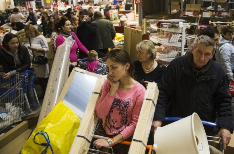 Russians flock to stores to pre-empt price rises