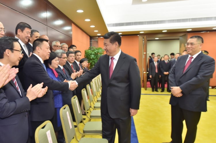 Xi cautions Macau against foreign forces