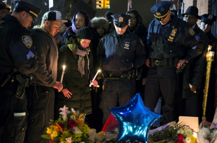 Shock, anger in N.Y. after 2 police killed