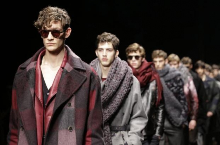 Milan Fashion designers celebrate normality