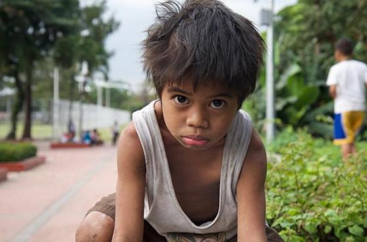 Hard life for Manila’s hungry street urchins