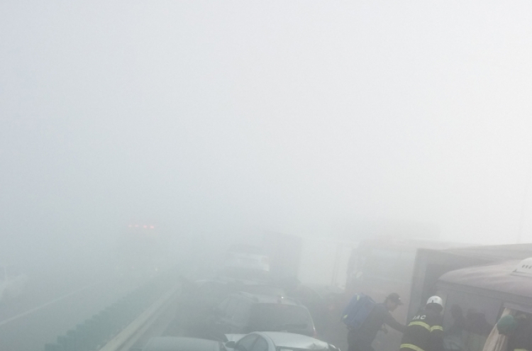2 dead, over 60 injured in 100-car pileup near airport