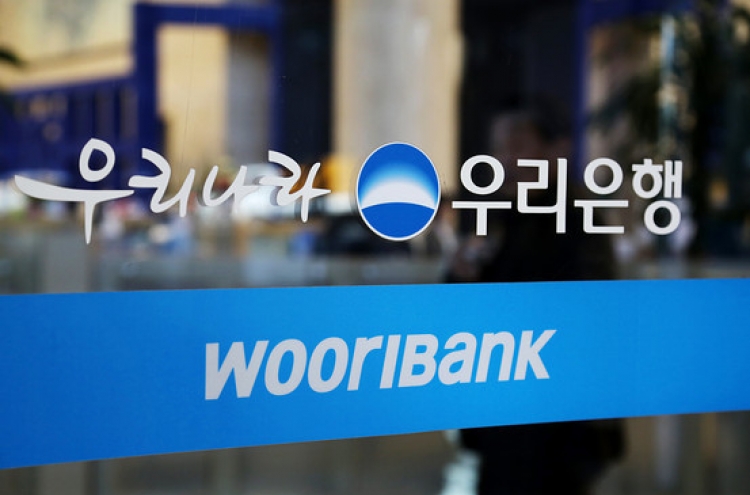 [Newsmaker] Korea plans July bidding to sell Woori