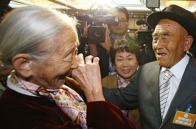 Emotions high at Koreas' separated family reunions