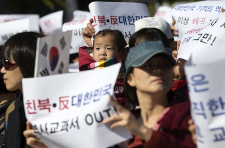 Ruling party links state textbook opponents to North Korea