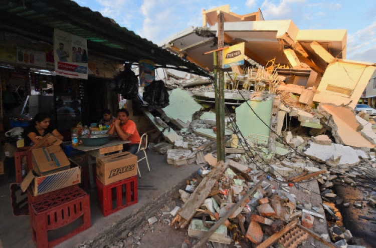 Ecuador digs for survivors after quake kills 246