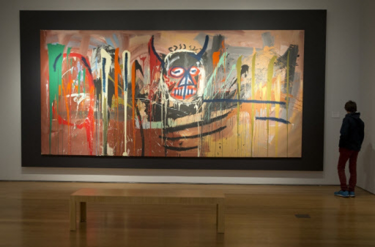 Basquiat sets artist record at Christie’s sale at $57.3 million