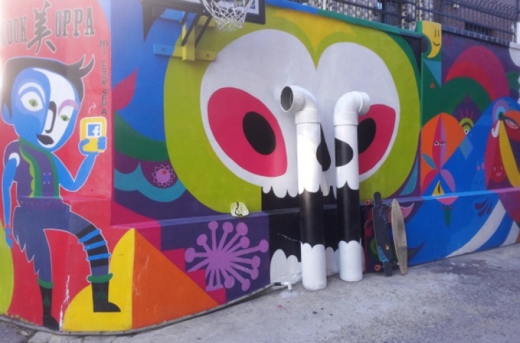 Expat artists team up to extend murals around Mi Cook Oppa
