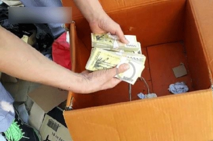 Woman accidentally throws away W20m cash