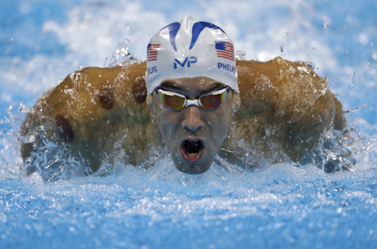 [Newsmaker] Phelps bids for astonishing 20th gold