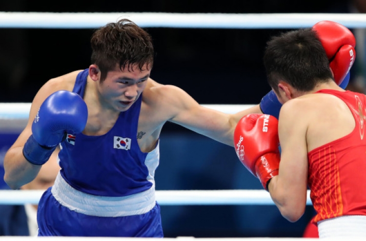 Lone Korean boxer loses in competition's 2nd round