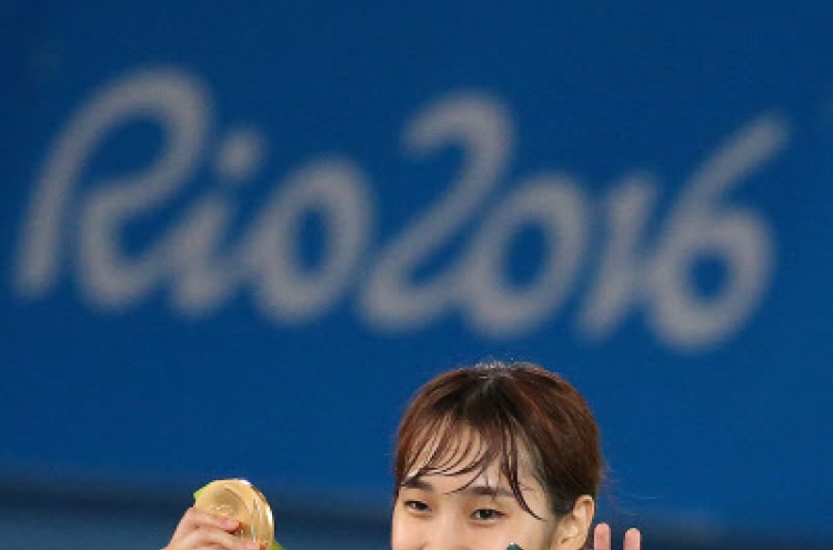 Korean Kim So-hui wins taekwondo gold