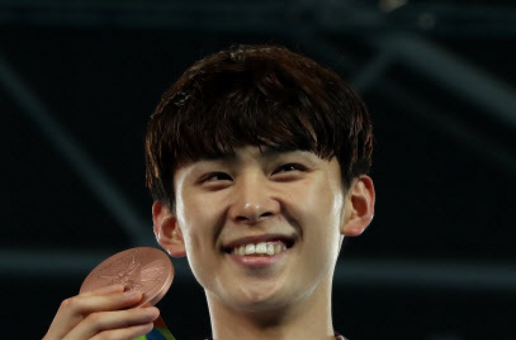 Korean Kim Tae-hun wins taekwondo bronze