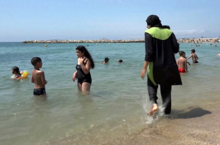 French beach burkini ban sparks disdain across the sea
