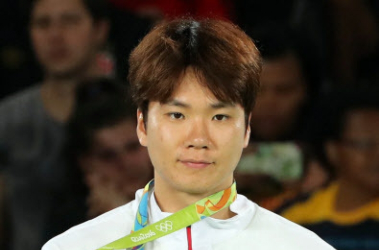 Taekwondo medalist grateful for bronze at final Olympics