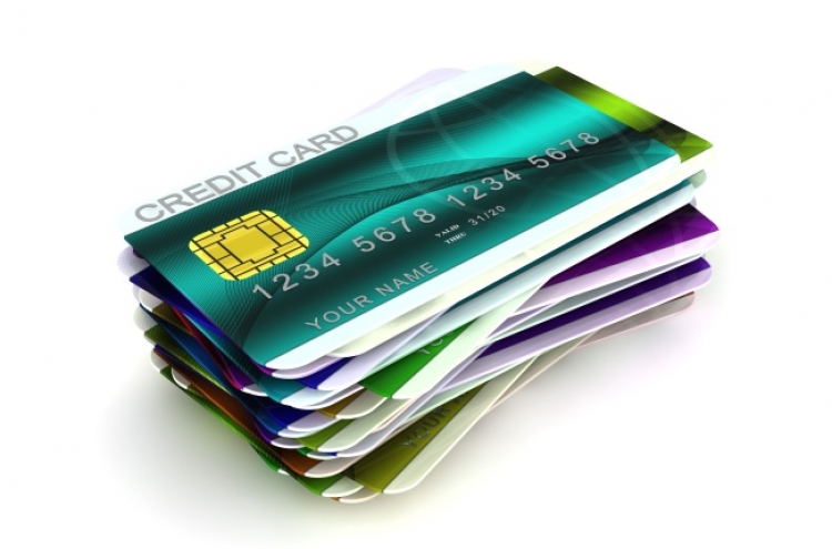Profits of credit card firms down 13% in H1