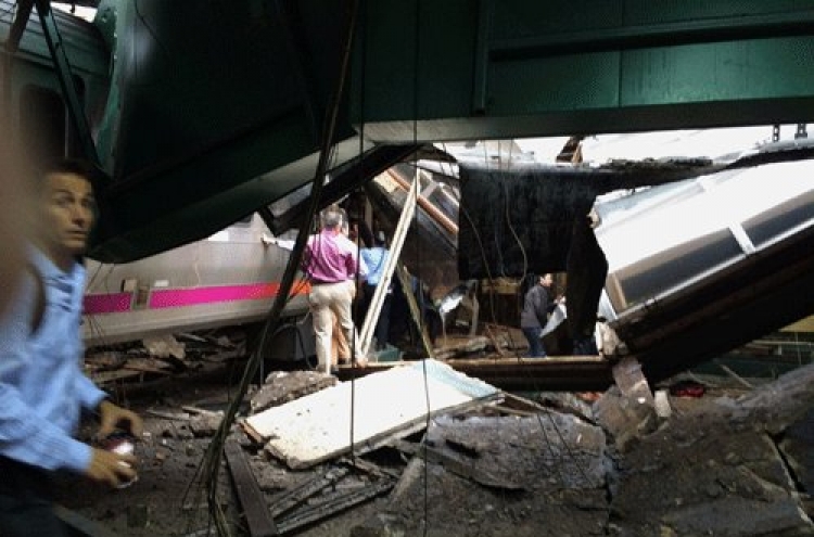 1 dead, over 100 hurt in train crash at New Jersey station