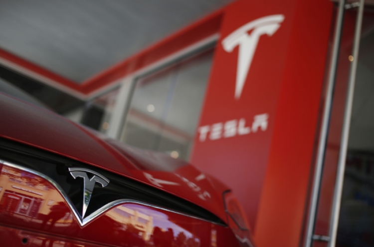 [Newsmaker] Tesla surprises with quarterly profit