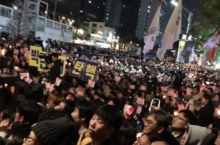 Massive protest rally held in Seoul to press Park to act