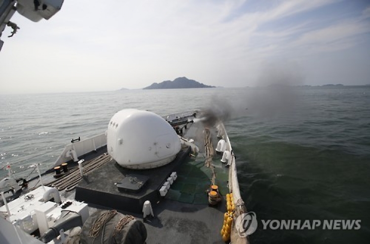 Korea uses crew-served weapon against illegal Chinese fishing boats