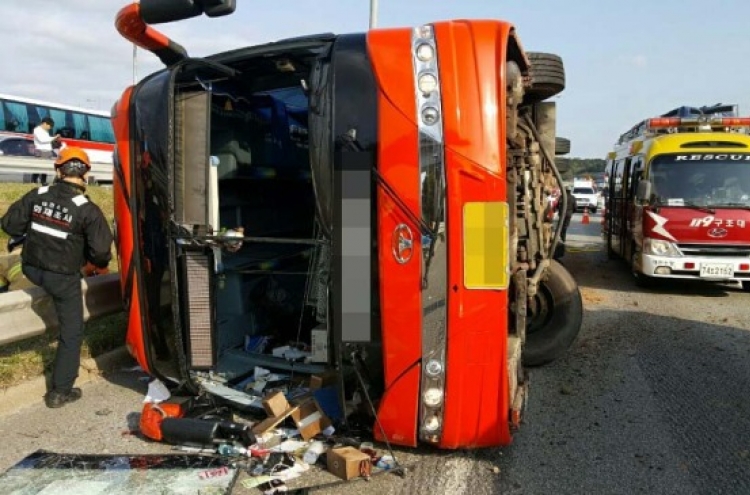 Bus turns over on highway, kills 4